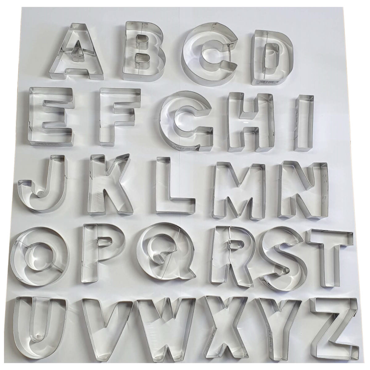 Set of 26 professional quality stianless steel cookie cutters in letter or alphabet shapes.
